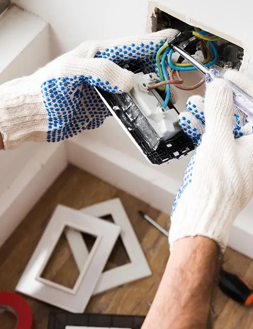 Electrician working on a plug/socket installation